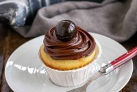 Golden Bliss: Cupcakes Crowned with Silky Ganache