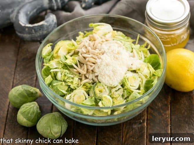 Brussels Sprouts Slaw with Lemon Vinaigrette 2 Fresh ingredients laid out for making shaved Brussels sprouts salad.