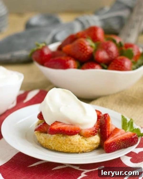 Gourmet Strawberry Shortcakes featuring a delicate white chocolate whipped cream.