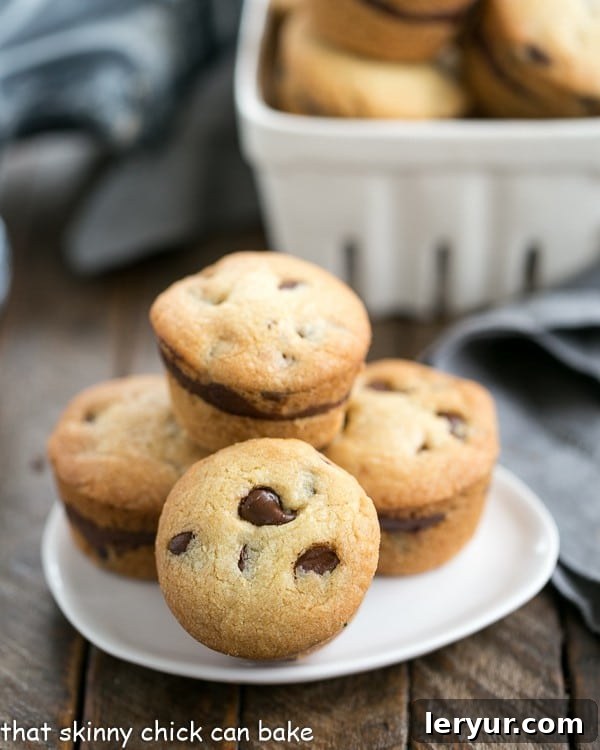 Homemade chocolate chip button cookies on a white plate, perfect for sharing
