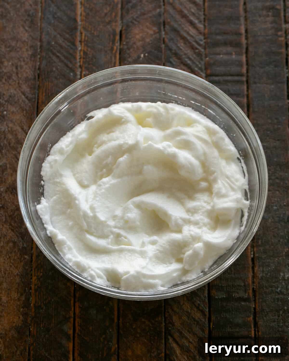 Julia Child's Legendary French Chocolate Mousse 3 Step-by-step image of beating egg whites until stiff peaks form.
