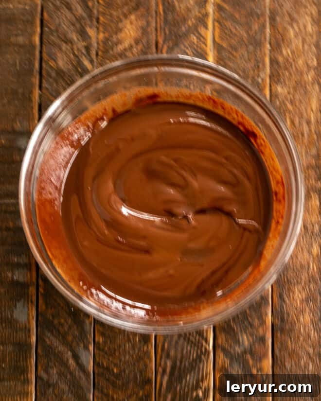 Ultimate Peanut Butter Fudge Swirl Cookies 4 Step 1: Melting chocolate and butter together in a bowl.