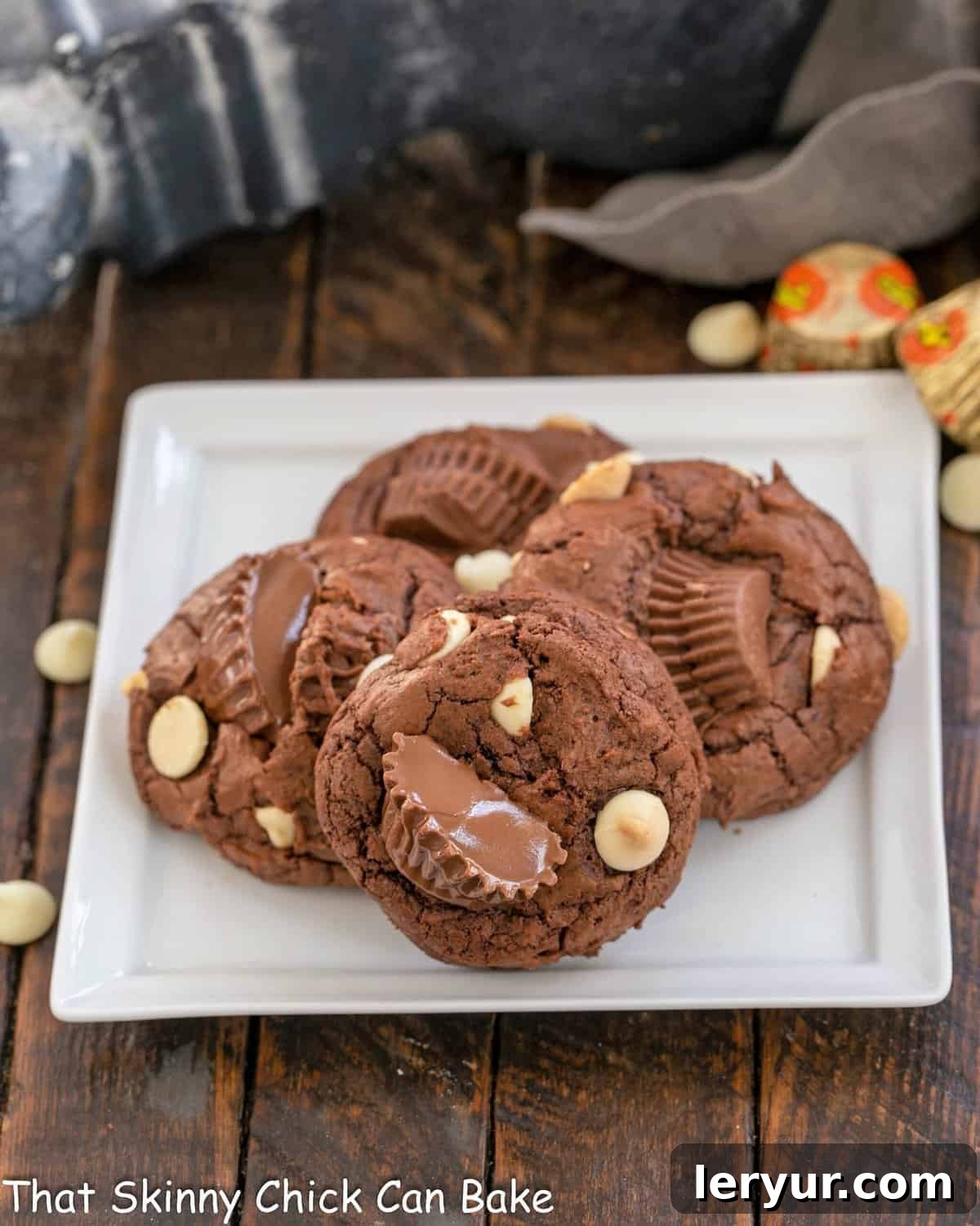 Ultimate Peanut Butter Fudge Swirl Cookies 8 Four delicious Moose Tracks Cookies on a square white ceramic plate.