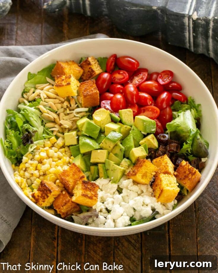 Macho Salad ingredients in a white serving bowl.