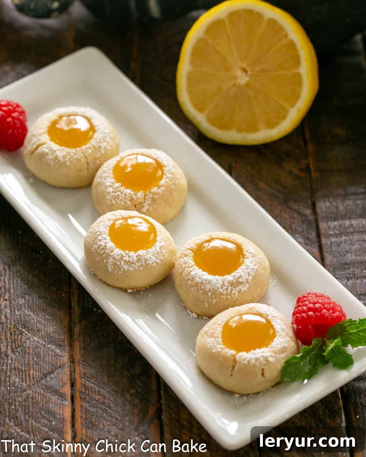Sunny Lemon Impressions 2 Lemon thumbprints on a white serving dish.