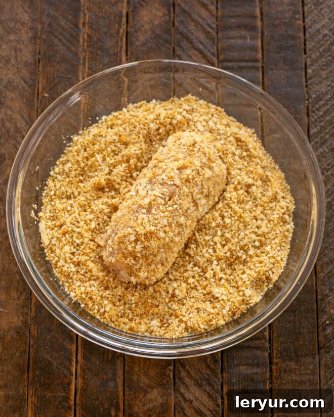 Step 6 making chicken cordon bleu.