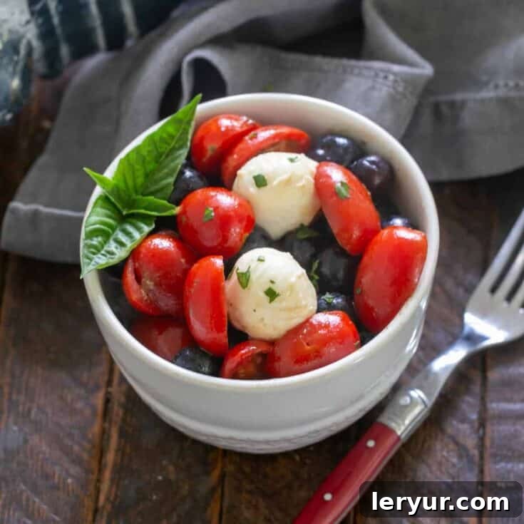 Blueberry Caprese Salad in a small salad bowl.