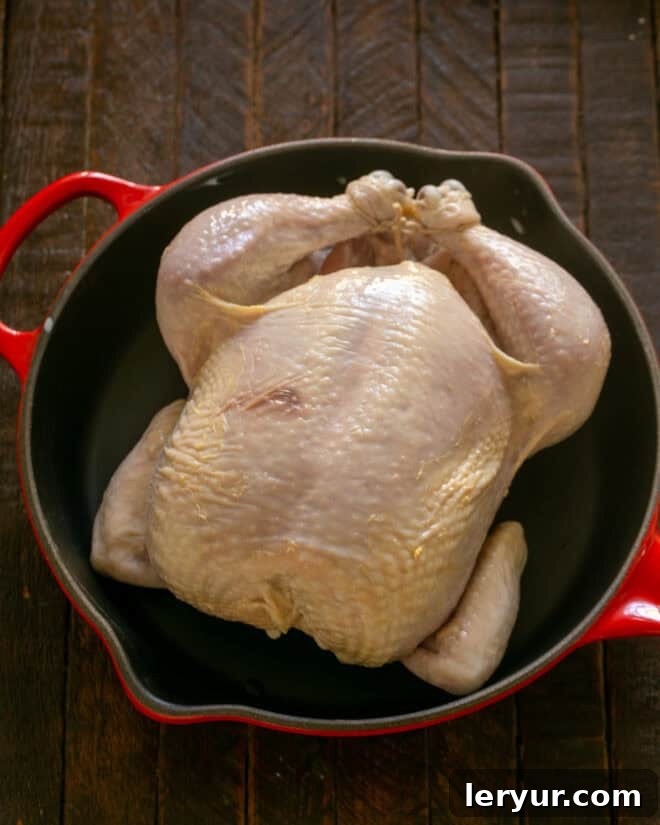 The Ultimate Buttermilk Chicken 6 Marinated chicken in a roasting pan.