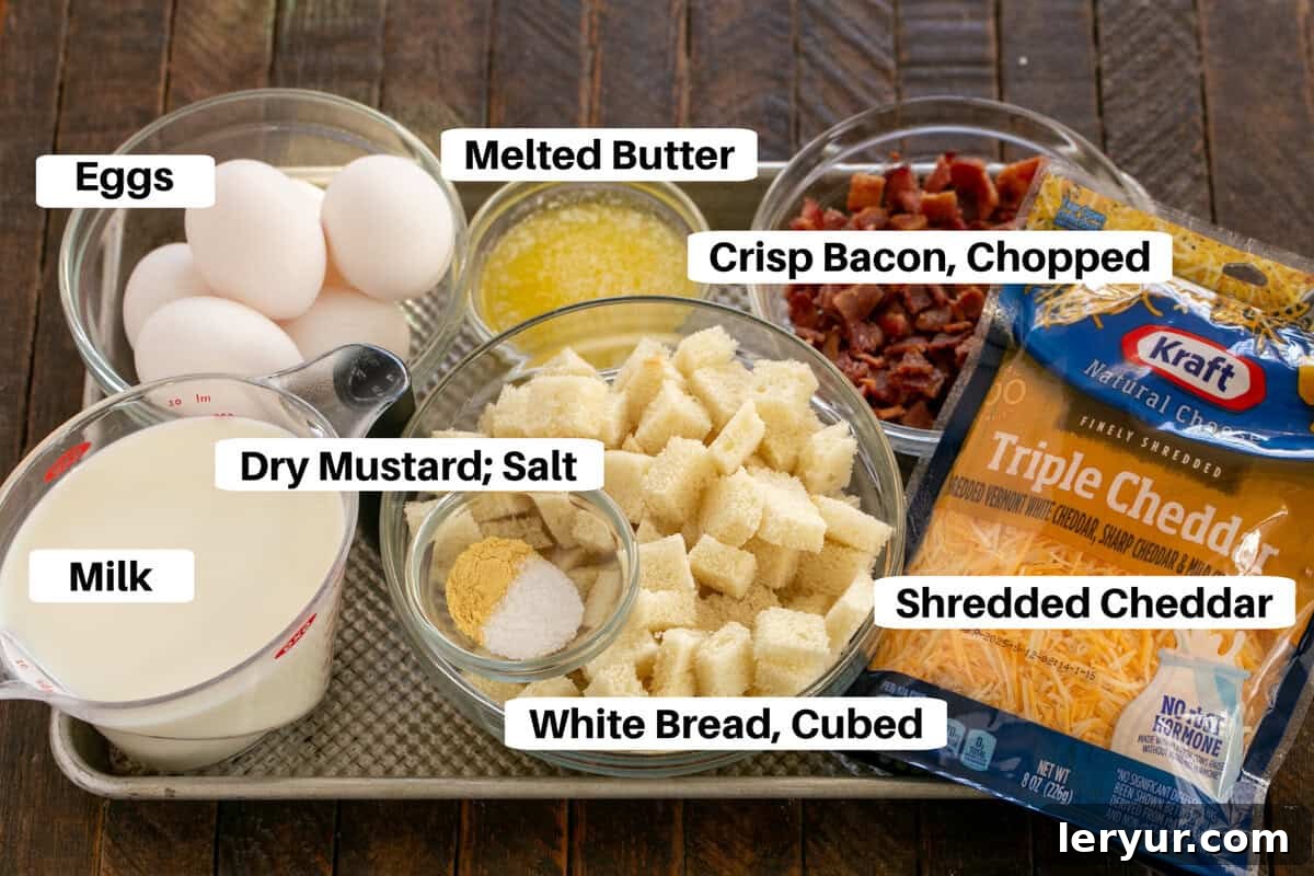 Overnight breakfast casserole ingredients arranged on a sheet pan with labels.