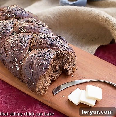 Pumpernickel Loaves on a wooden cutting board