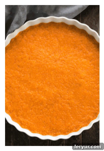 Sweet Potato Casserole filling in a baking dish.