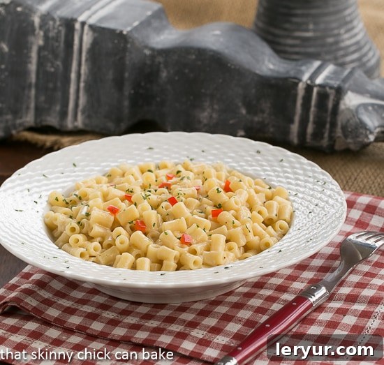 Close-up shot of a serving of Dressy Pasta Risotto, showcasing its creamy texture and small pasta shapes, ready to be enjoyed as a luxurious meal.