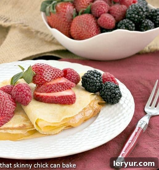 Butter and Rum Crepes | Infused with Grand Marnier and rum and generously filled with lemon curd, these are truly exceptional crepes!