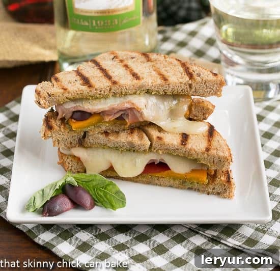 Mediterranean Grilled Cheese sandwich, a close-up showing the golden crust and vibrant fillings, ready to be enjoyed