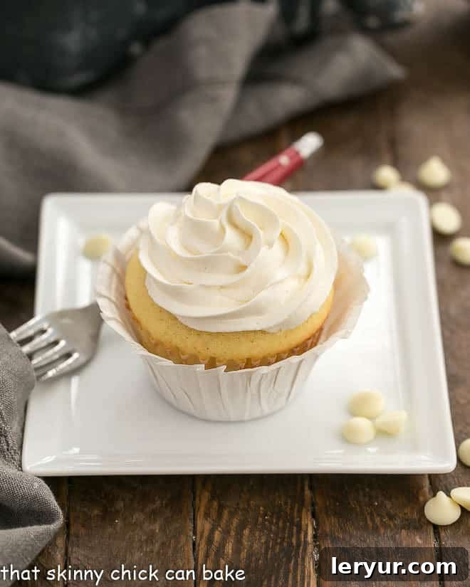 Vanilla Cupcakes with White Chocolate Buttercream on a square white dish