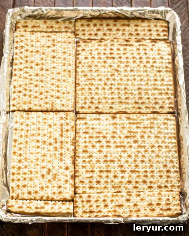 Step 1: Layer Matzo on a rimmed sheet pan covered with foil and parchment paper.