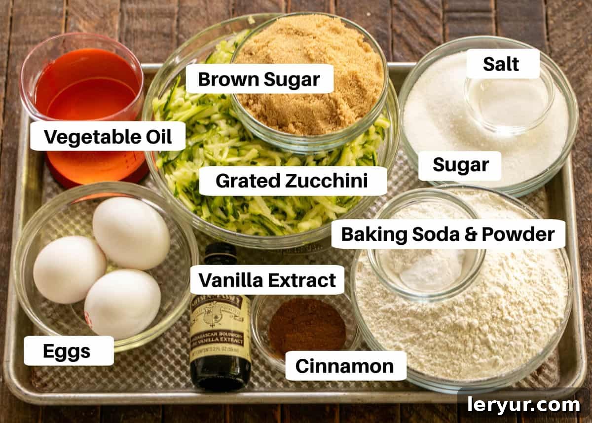 Grandma's Tried and True Zucchini Bread 2 Zucchini bread ingredients on a sheet pan with labels.
