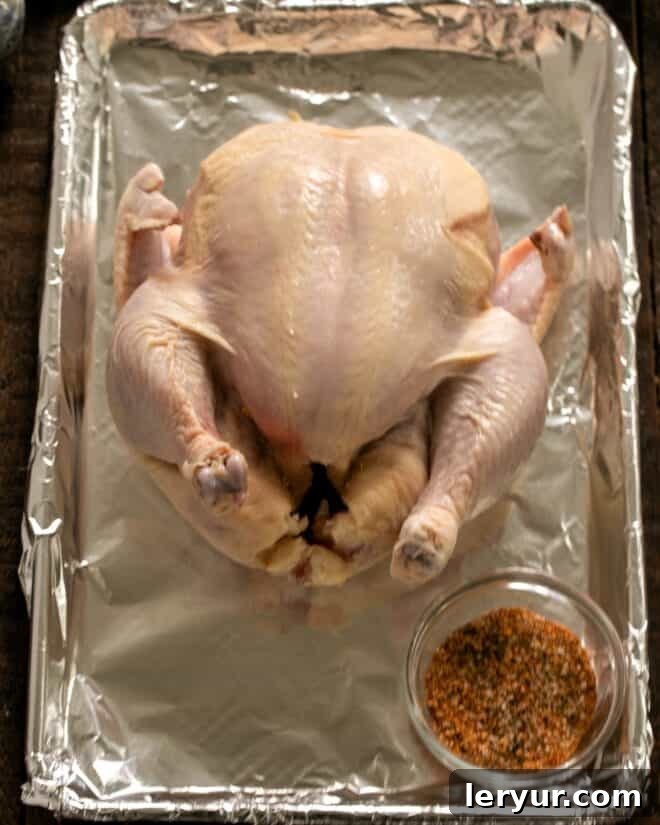 Rotisserie Chicken Perfection 3 Place Chicken on sheet pan and pat dry.