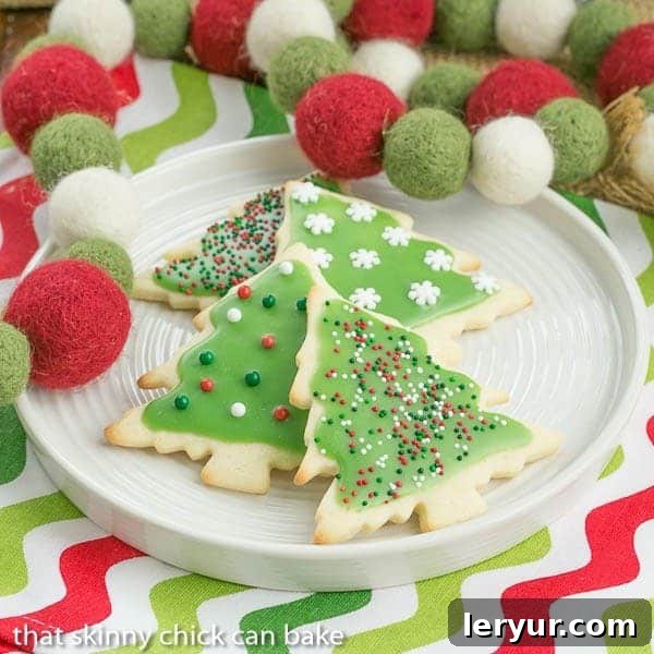 Beautifully iced Christmas sugar cookies in festive shapes