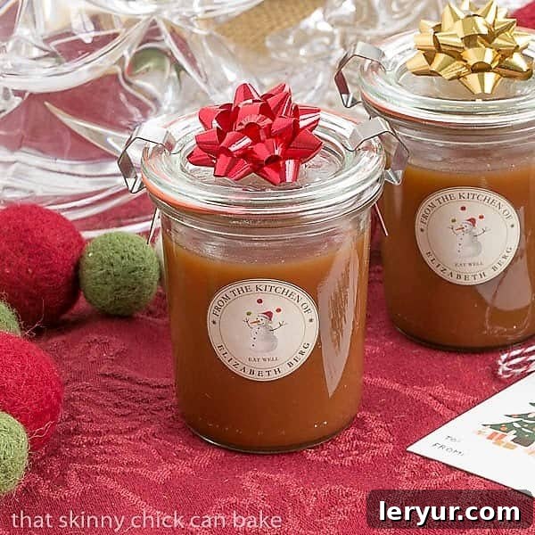 Individual Microwave Caramel Sauce jars tied with bows, perfect for homemade gift giving during the holidays.