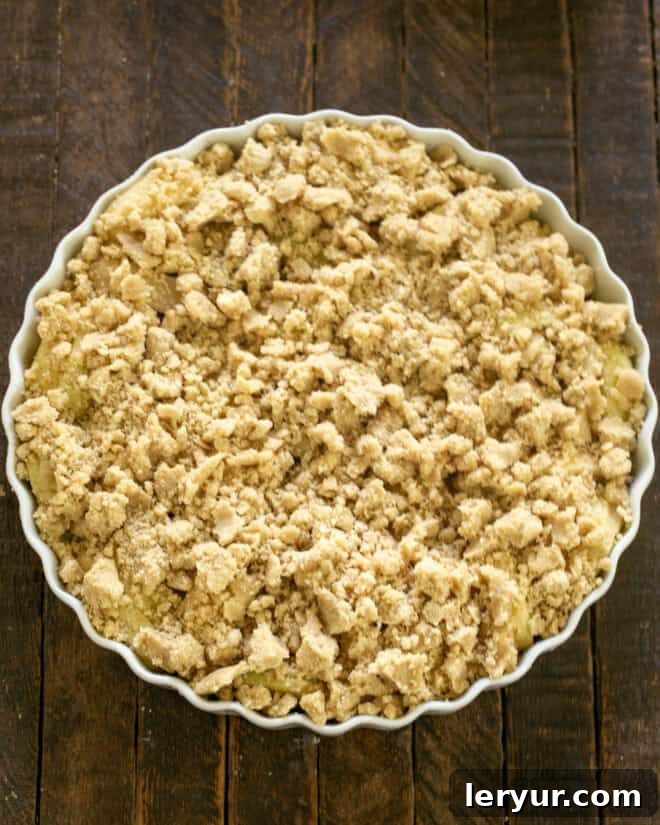 Apple crisp with topping added.
