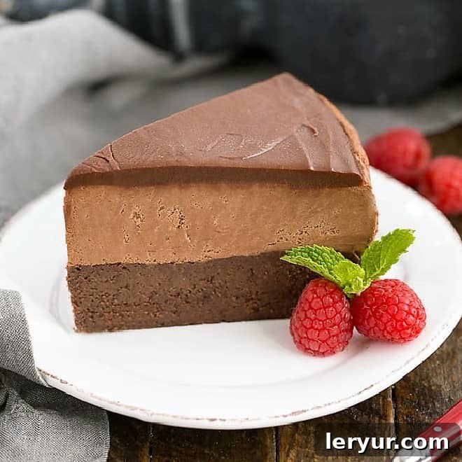 Dreamy chocolate dessert: Frozen Chocolate Mousse Cake with flourless chocolate cake base, chocolate mousse, and rich ganache.