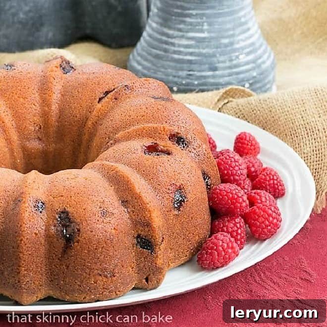 Delicious Raspberry Amaretto Bundt Cake, a pound cake full of raspberries and Amaretto liqueur.