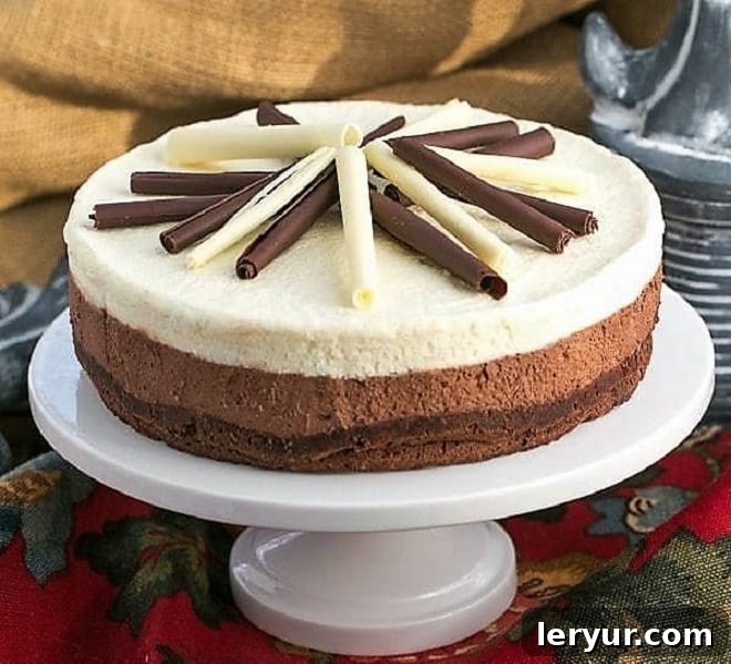 Impressive three-layer Chocolate Mousse Cake, as delicious as it is stunning.