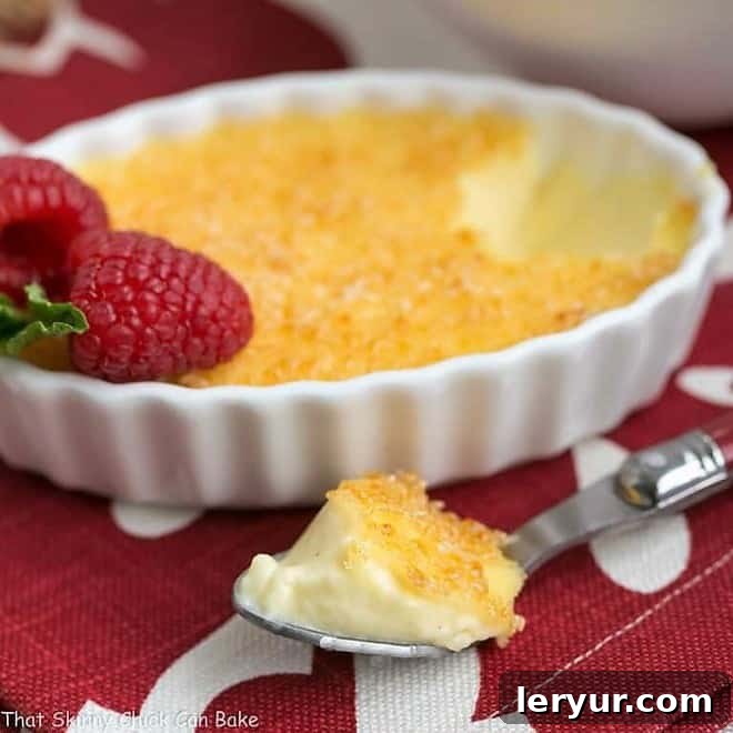 Classic Crème Brûlée - a fabulous vanilla custard topped with a thin layer of brittle, caramelized sugar Classic Crème Brûlée with a spoonful removed and set in the foreground.