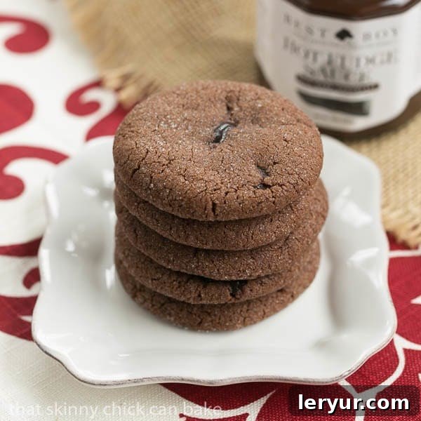 Chocolate Lava Cookies - chocolate butter cookies filled with hot fudge sauce A stack of Chocolate Lava Cookies