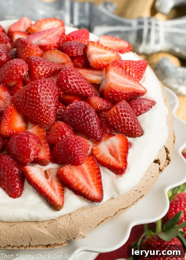 Strawberry Topped Chocolate Pavlova - A chocolate meringue topped with mascarpone cream and luscious strawberries Chocolate Pavlova - A chocolate meringue topped with mascarpone cream and luscious strawberries