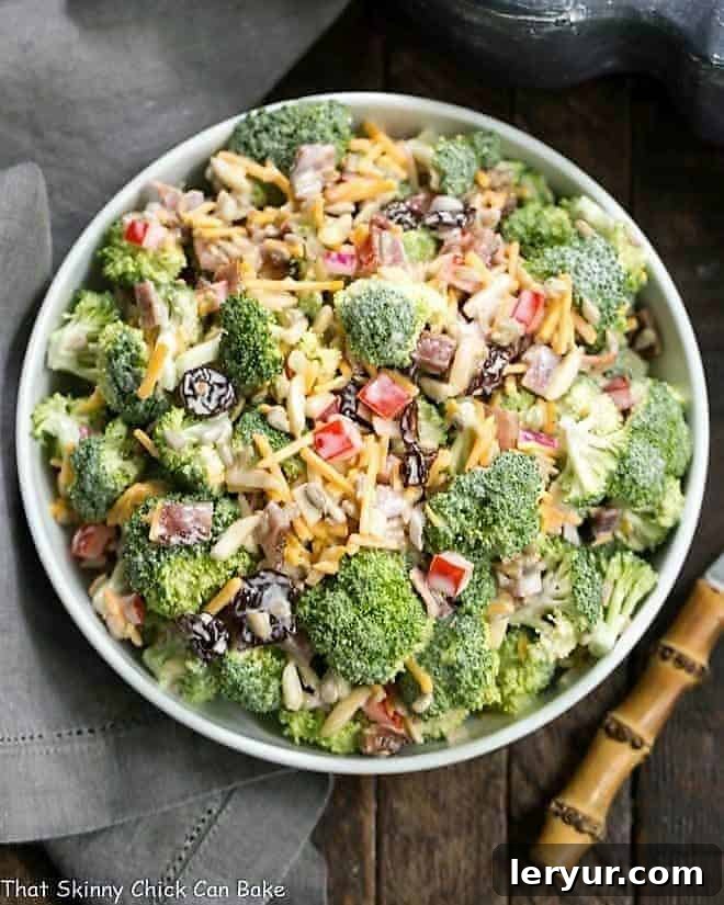 Sweet and Savory Broccoli Crunch Salad 6 Broccoli salad in a white serving bowl, ready to be served.