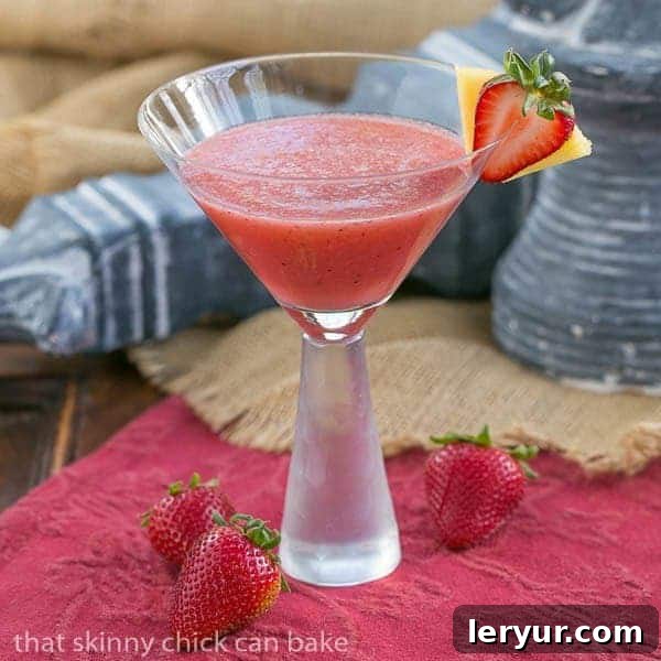 Hawaiian Sunset Cocktail - Strawberries, pineapple and rum form an irresistible tropical drink
