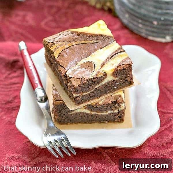 Ricotta Cheesecake Brownies stacked on a square white plate with a red handled fork.