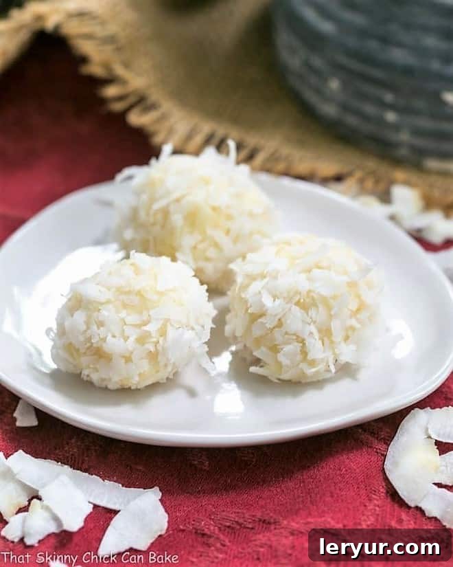 Coconut White Chocolate Truffles on an oval white plate
