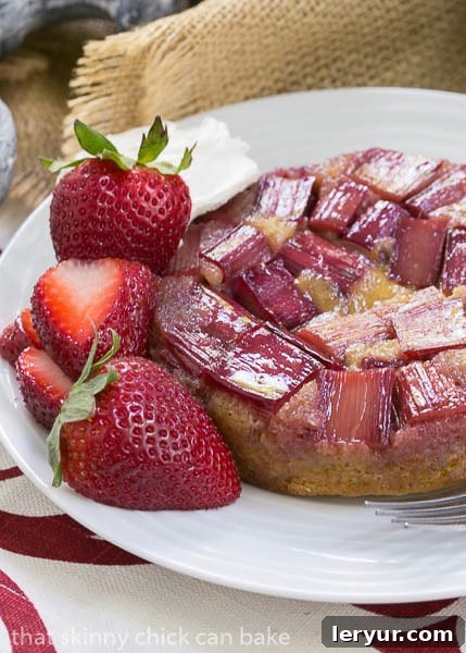 Rhubarb Upside Down Brown Sugar Cake - A seasonal French cake featuring rhubarb Close-up of Rhubarb Upside Down Brown Sugar Cake, showing texture and glaze