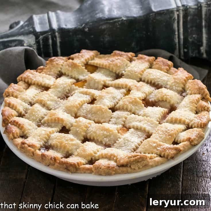 Side view of lattice topped peach pie recipe
