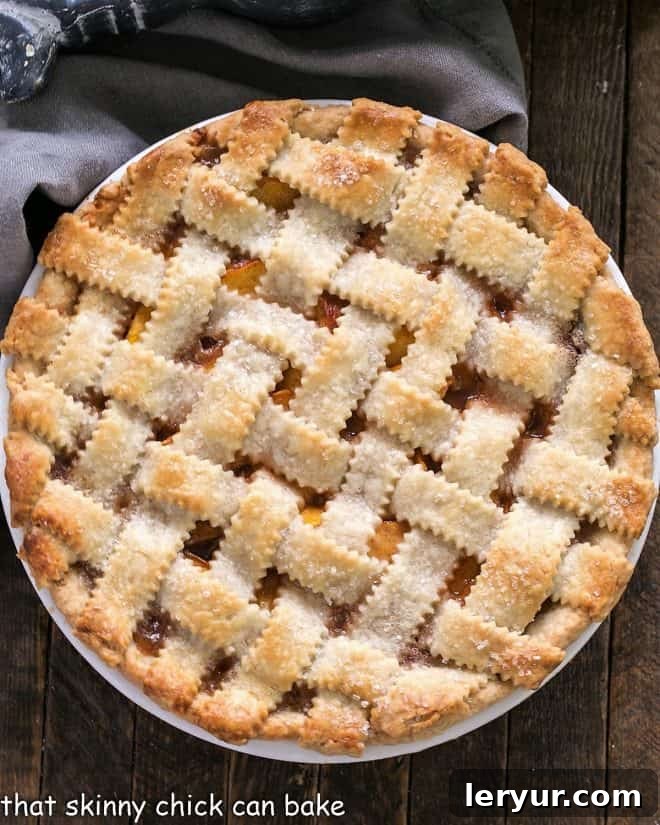 Sweet Summer Peach Lattice Pie 6 Overhead view of a Classic Peach Pie with a lattice crust