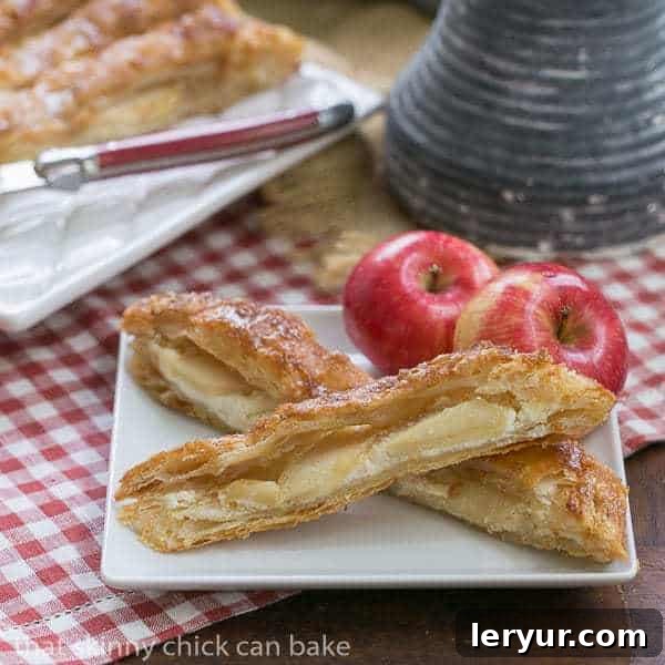 Maple Glazed Apple Tart - Puff pastry, sweetened cream cheese, apples and a maple glaze make for a spectacular breakfast or dessert