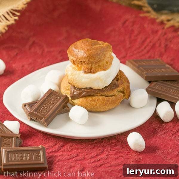 S'mores Cream Puffs | A gourmet s'mores dessert that will dazzle your friends! A beautiful close-up of the finished cream puffs.