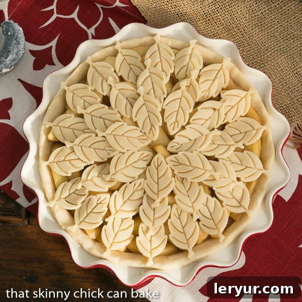Leaf Topped Apple Pie | A scrumptious apple pie with a fun pastry topping before baking.