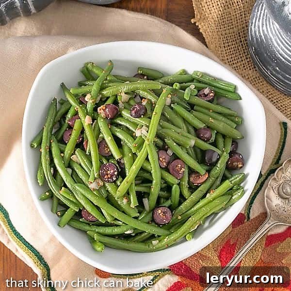 Overhead view of a bowl of mustardy haricots verts