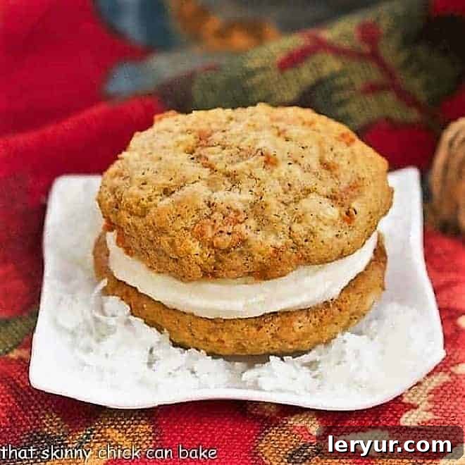 Carrot Cake Whoopie Pies - All the magnificent flavors my from my easy carrot cake recipe in these fabulous whoopie pies Carrot Cake Whoopie Pie sitting on a bed of flaked coconut.