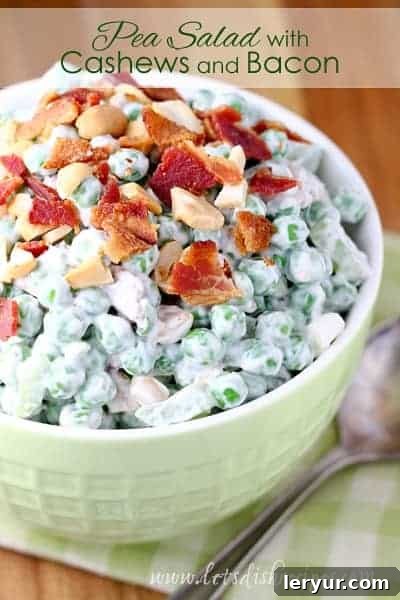 A unique and delicious pea salad featuring a harmonious blend of sweet peas, crunchy cashews, and savory bacon, tossed in a creamy dressing.
