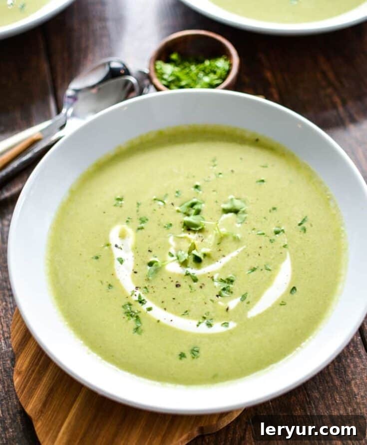 A vibrant and creamy soup celebrating spring produce, featuring tender asparagus, sweet spring peas, and peppery watercress.