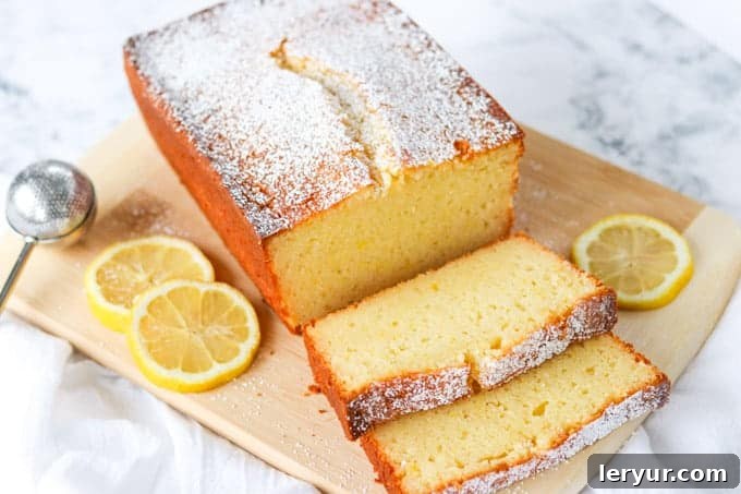 A dense, moist, and delicious Lemon Ricotta Pound Cake, intensely flavored with both lemon zest and juice for a vibrant citrus taste.