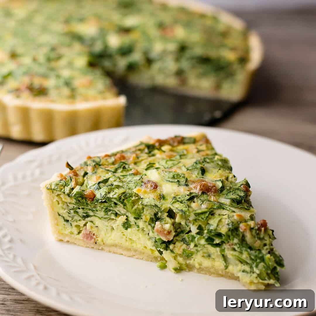 A savory and delicious Bacon Spinach Artichoke Quiche, featuring a creamy filling with earthy spinach, tangy artichoke, and crispy bacon, ideal for spring brunch.