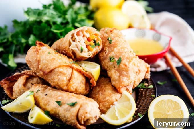 Crispy Lemon Chicken Egg Rolls, featuring a savory and zesty chicken filling, making a fun appetizer or a light, flavorful dinner.