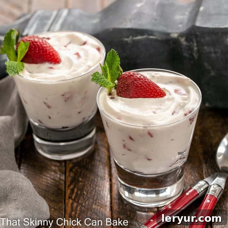 Refreshing No-Bake Strawberry Fool served in a clear glass, showing layers of fresh strawberries and creamy whipped mixture.