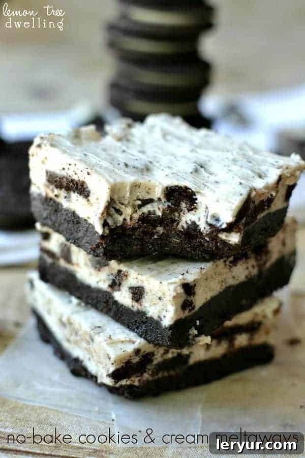 No-Bake Cookies & Cream Meltaways, a delightful chocolate and cream treat, arranged enticingly on a plate.